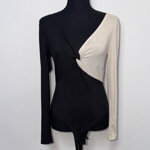 Elegant Black and Cream Long Sleeve Bodysuit